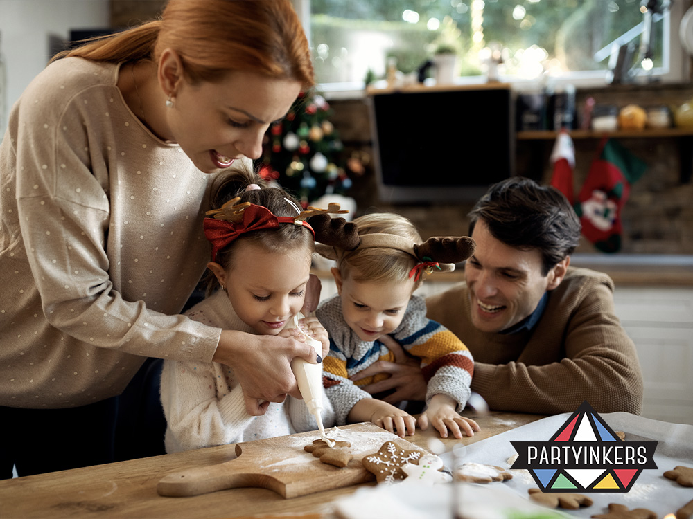 A family decorating gingerbread cookies together during a creative craft station activity at a corporate family day event, encouraging hands-on fun for all ages