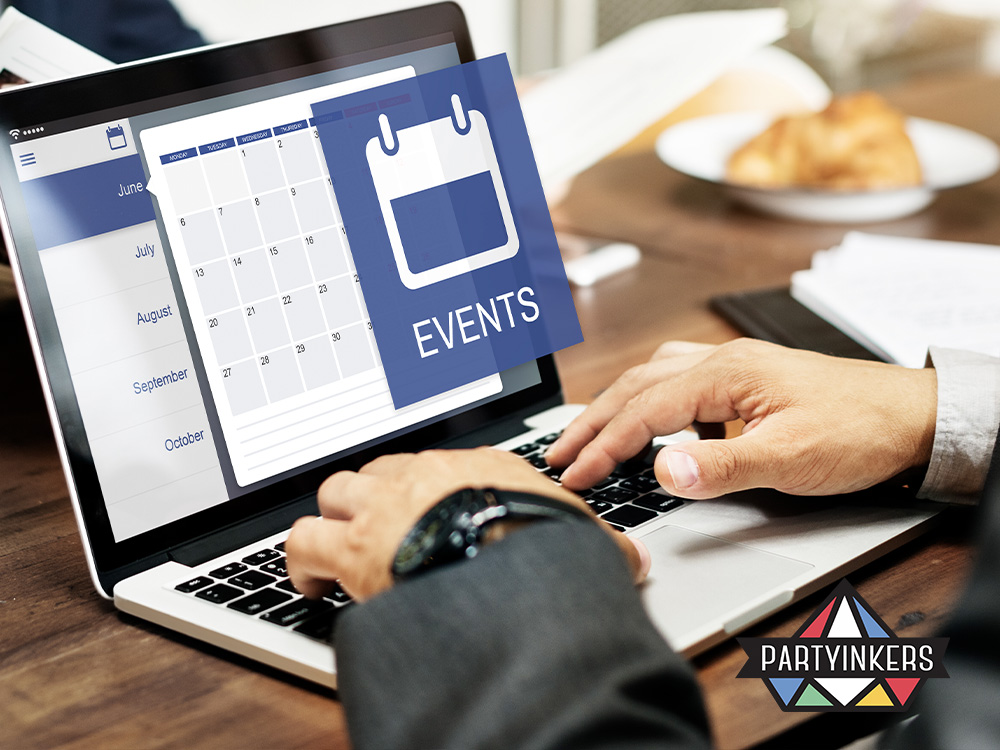 Person planning a gala dinner event schedule on a laptop, illustrating the importance of integrating entertainment seamlessly into the event for smooth timing and flow.