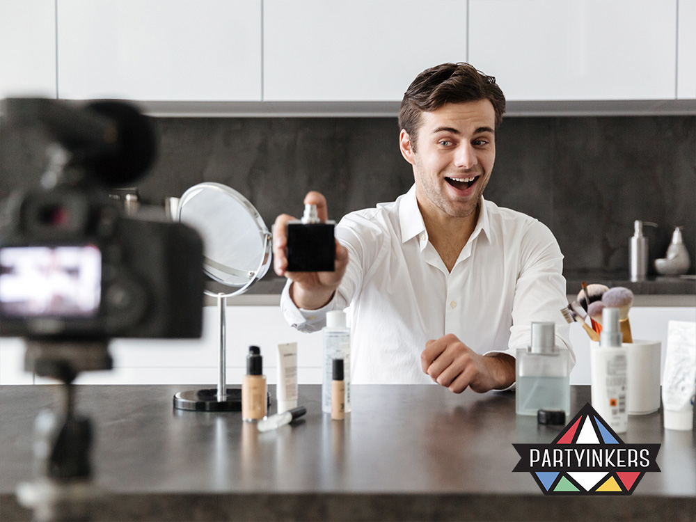 A presenter enthusiastically demonstrating a product on camera, capturing the essence of live product demonstrations as an engaging and informative interactive booth idea.