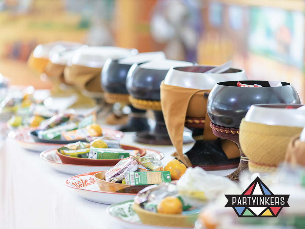 A line of beautifully arranged food offerings at an event, showcasing one of the interactive event ideas where attendees can engage with interactive food and beverage stations, allowing them to personalize their meal experience and enhance participation.







