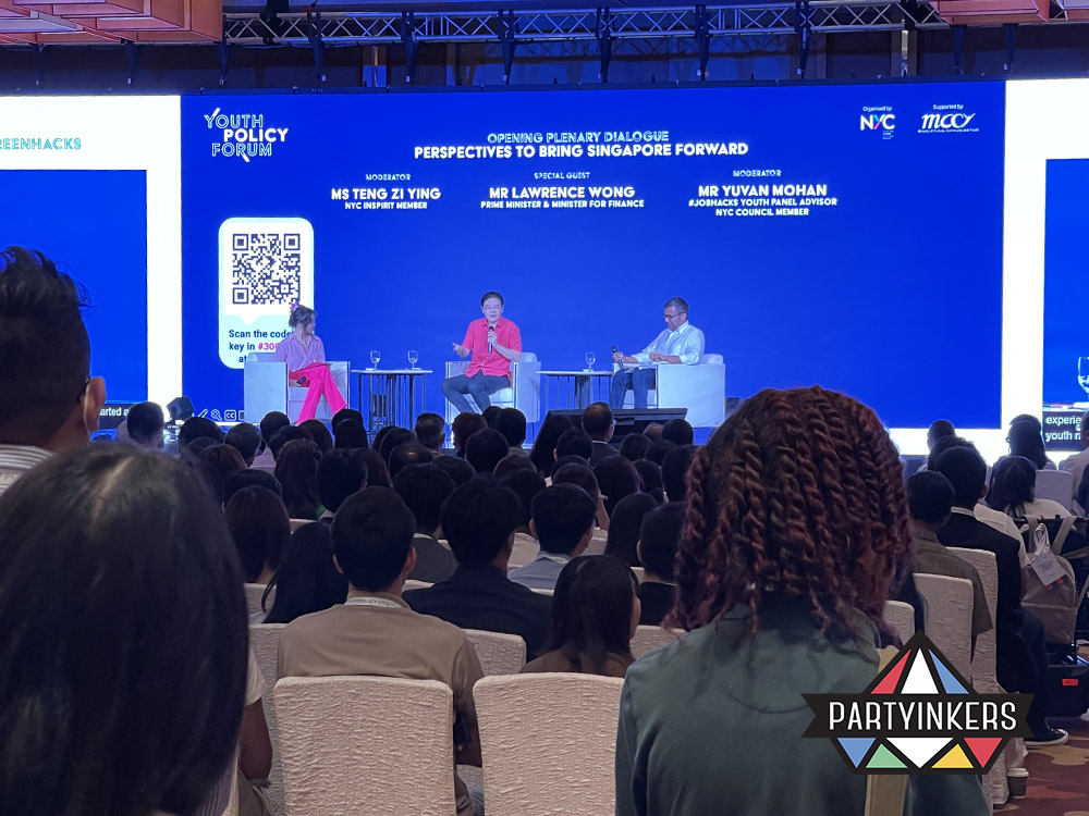 A panel discussion taking place at the Youth Policy Forum with attendees listening to the speakers, showcasing one of the interactive event ideas where live discussions and Q&A sessions engage the audience in meaningful dialogue.






