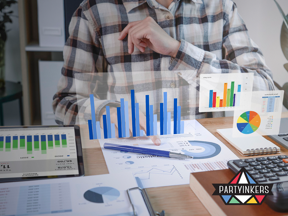A person pointing to a screen displaying colorful bar and pie charts, representing data analysis and visualization for business insights.