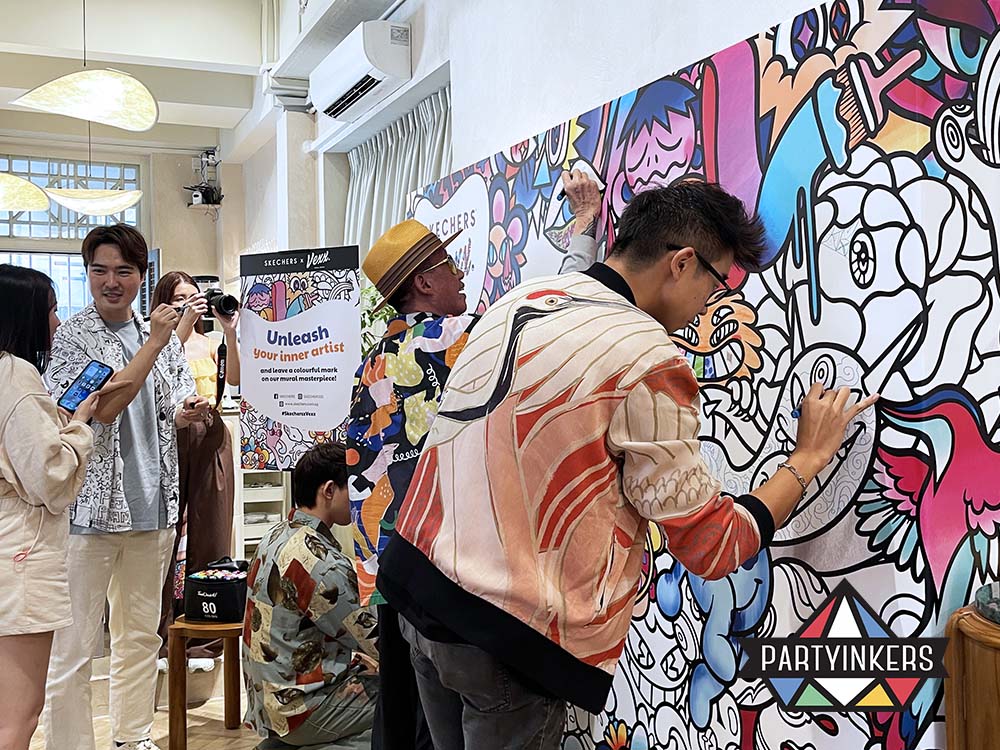 Skechers x Vexx event set up a physical graffiti wall where their attendees can create art and leave messages.