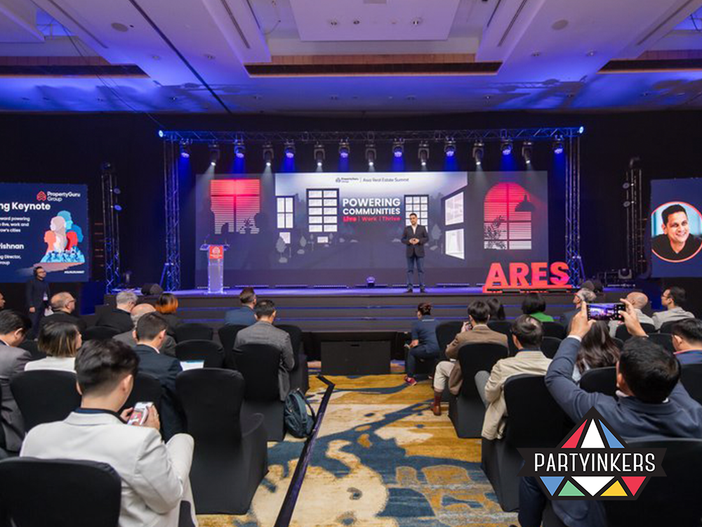 Dynamic presentation at the ARES summit, engaging attendees with innovative conference insights and multimedia presentations.