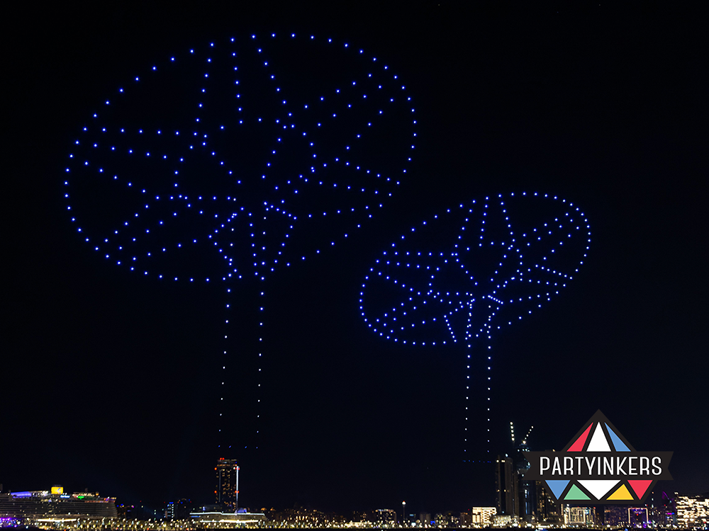 A mesmerizing drone light show illuminating the night sky, a spectacular example of futuristic conference entertainment ideas.