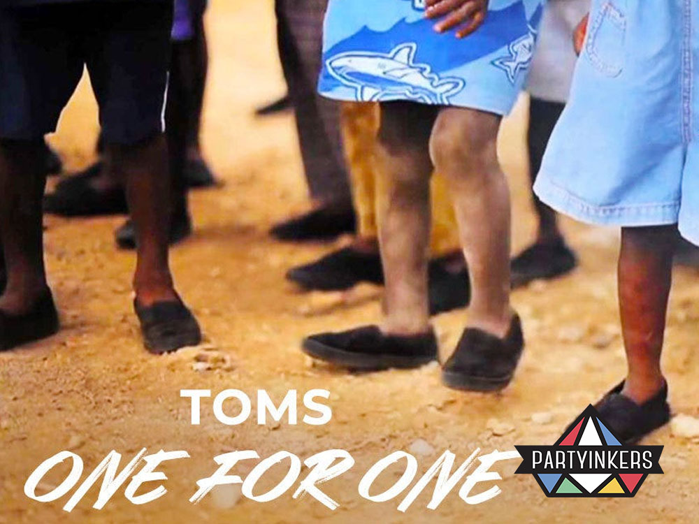 A TOMS Shoes campaign displaying donated shoes on children’s feet, highlighting impactful brand activation ideas through corporate social responsibility and cause marketing.