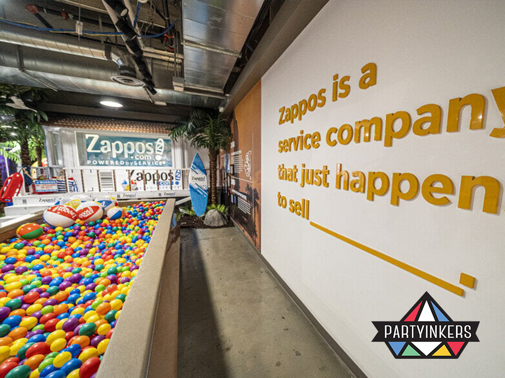 A vibrant Zappos workspace featuring a ball pit and immersive branding, showcasing playful brand activation ideas that enhance company culture and customer engagement.