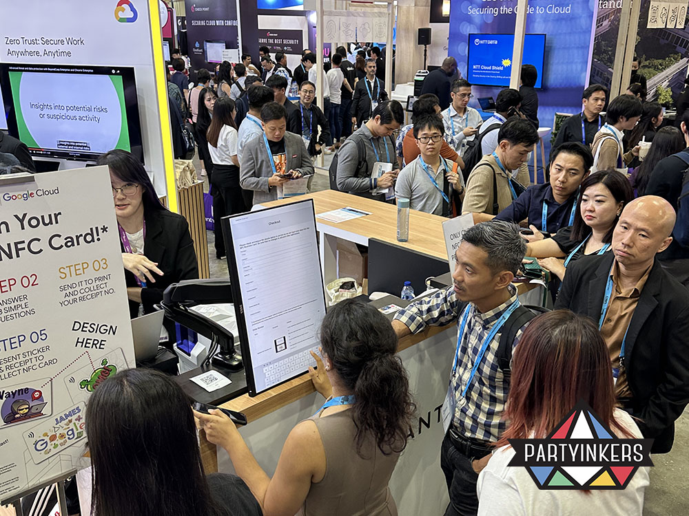 Google Cloud’s booth drawing high engagement with NFC card personalization, an innovative lead capture at trade shows technique by Partyinkers.